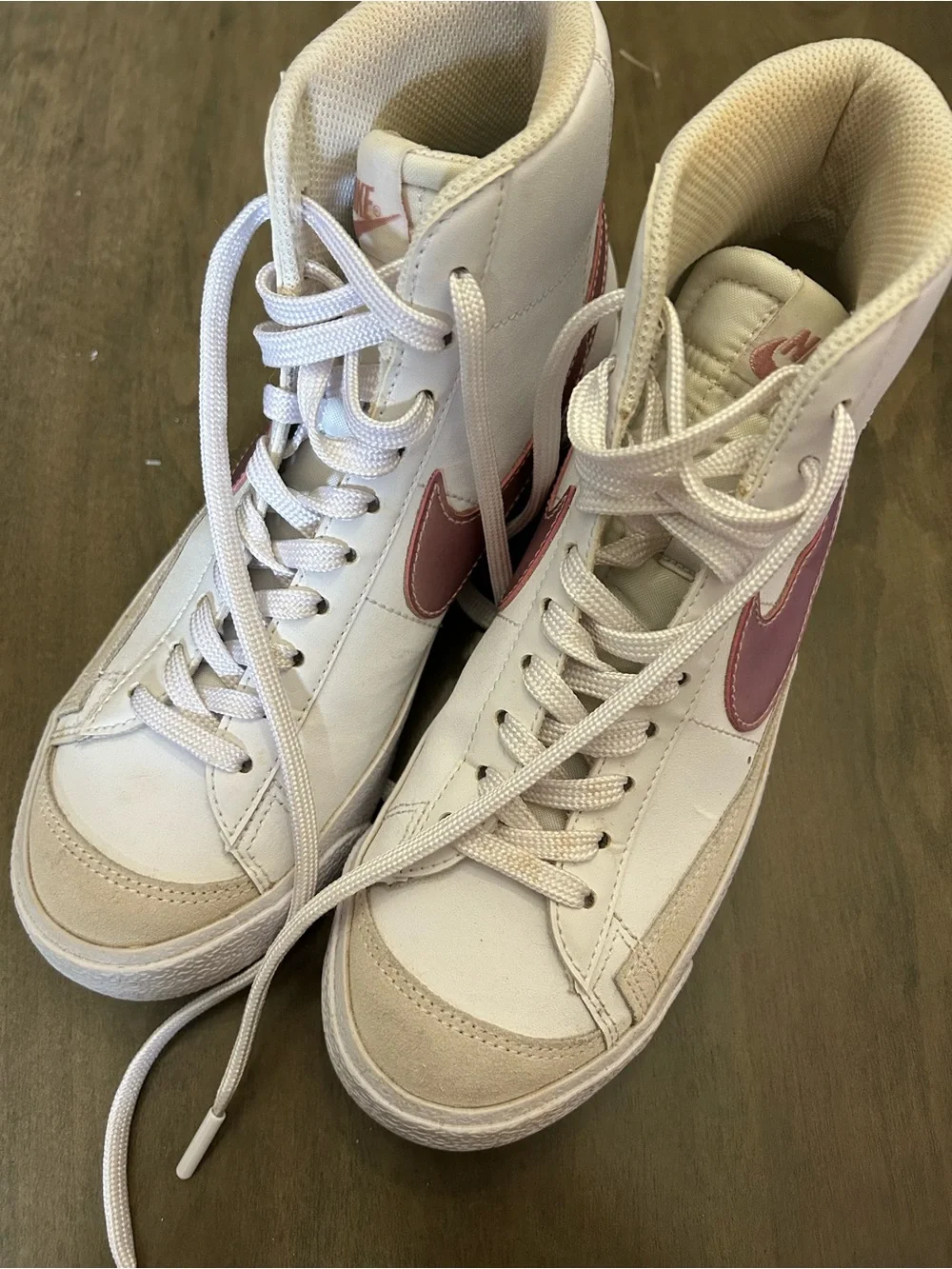 Nike High-Top Sneakers in White with Pink Swoosh